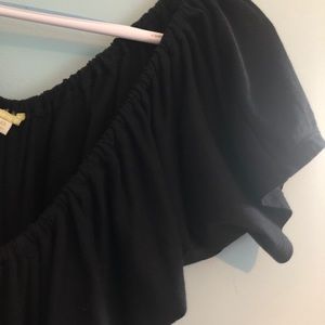 Black top with deep v-neck.